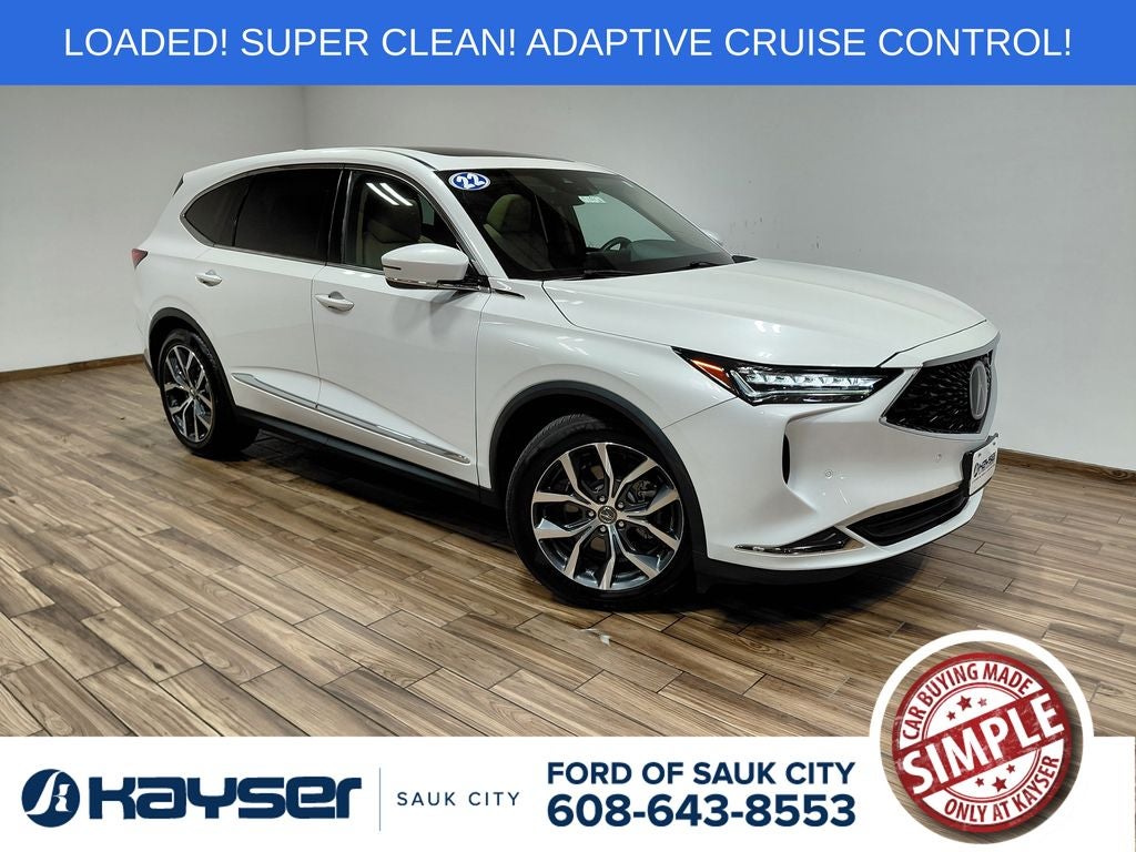 2022 Acura MDX Technology SH-AWD in Platinum White Pearl — front three-quarter view